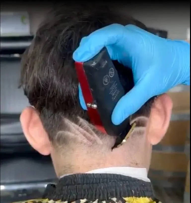 Close-up of design work on a fade at Saloon Cuts